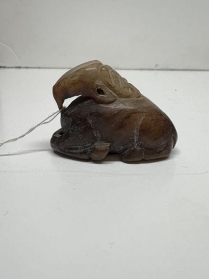 Chine, XXème siècle
Sujet en jade céladon...