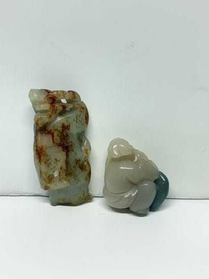 Chine, XXe
Deux statuettes en jade et rouille...