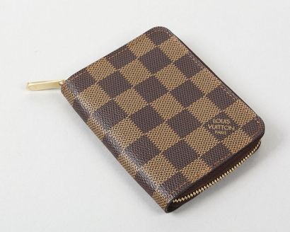 LOUIS VUITTON
Porte cartes, porte-monnaie...