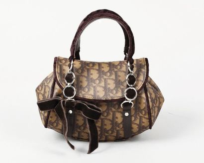 CHRISTIAN DIOR
Mini sac 18cm en toile siglée...
