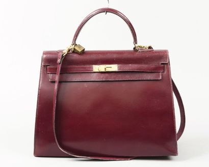 HERMES Paris
Sac «Kelly» 36cm en cuir bordeaux,...