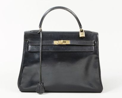 HERMES Paris
Sac «Kelly» 32cm en cuir noir,...