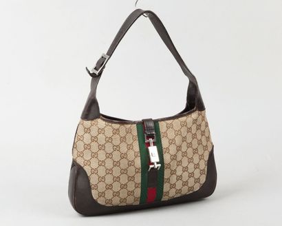 GUCCI
Sac en toile siglée chinée beige à...