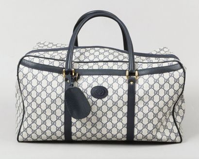 GUCCI
Sac de voyage 47cm en toile siglée...
