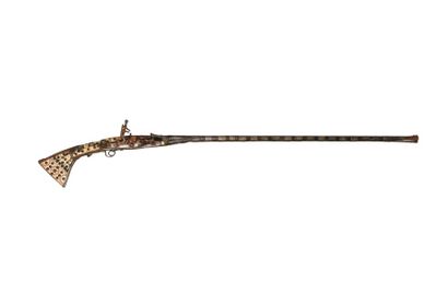 Fusil, mukhala, à platine à silex
Crosse...