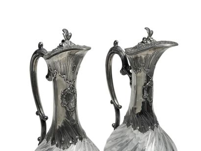 DEUX AIGUIERES en verre à large godrons tors...