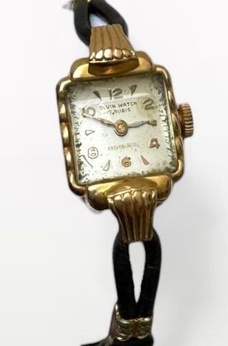 OLVIN WATCH
MONTRE BRACELET de dame en or...