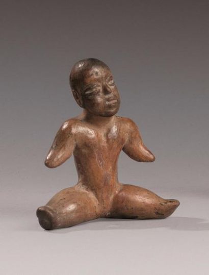 PERSONNAGE ASSIS
Terre cuite brune.
Culture...
