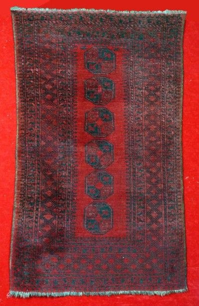 TAPIS AFGHAN (milieu XX siècle) à décor de...