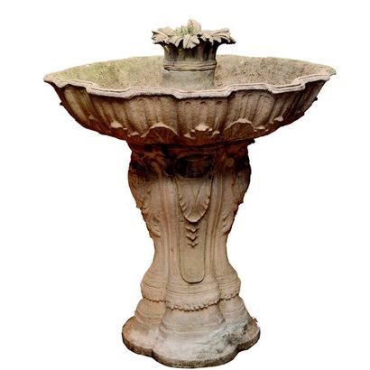 FONTAINE en pierre reconstituée à décor de...