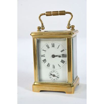PENDULETTE D’OFFICIER formant réveil en laiton...