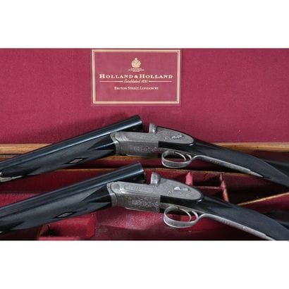 HOLLAND & HOLLAND. Paire de fusils de chasse...