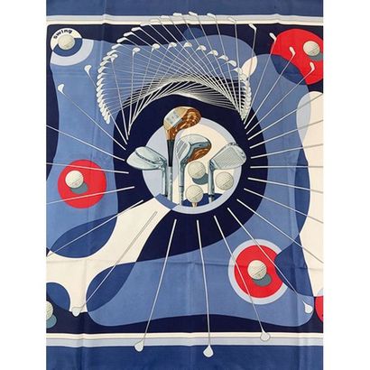 HERMES. Carré en soie « Swing » bleu et blanc....