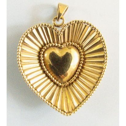 PENDENTIF cœur en or 750°/°°, 1 côté lisse...