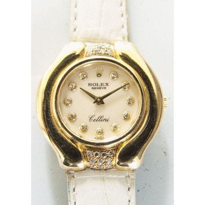 ROLEX-CELLINI. Montre de dame en or jaune...