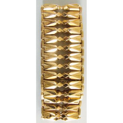 BRACELET ruban articulé en or jaune 750°/°°....