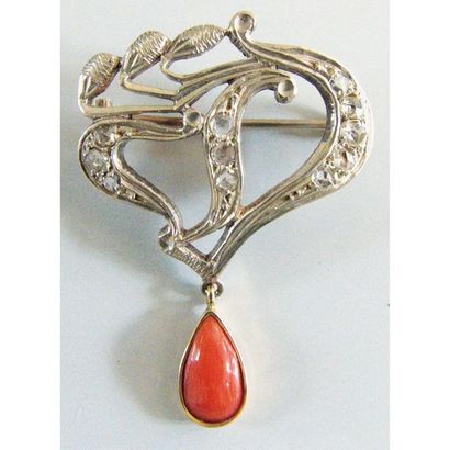 BROCHE en argent et or 750°/°° sertie de...