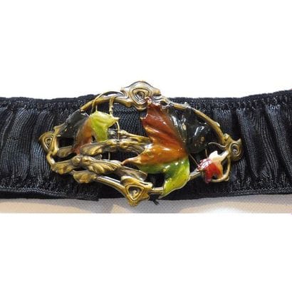 CEINTURE élastiquée en tissu noir orné d’une...