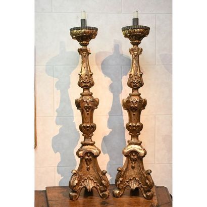 PAIR OF PIQUE-CIERGES in gilded wood, largely...