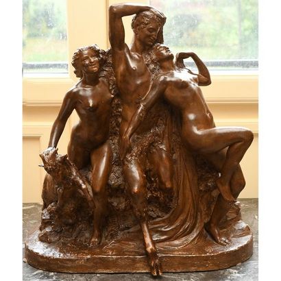 J. DESCOMPS. Patinated terracotta group representing...