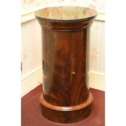 SOMNO in mahogany with a cylindrical shape....