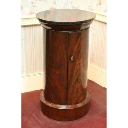 SOMNO in mahogany with a cylindrical shape....