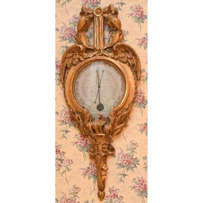 EMPIRE BAROMETER in gilded and carved wood...
