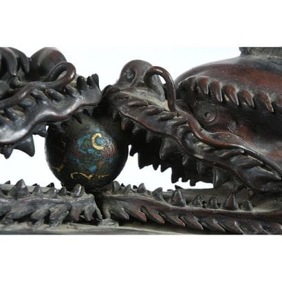 CURIOUS GOND in bronze and partitioned enamels...