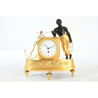 PENDULE EMPIRE AU MATELOT en bronze à double...