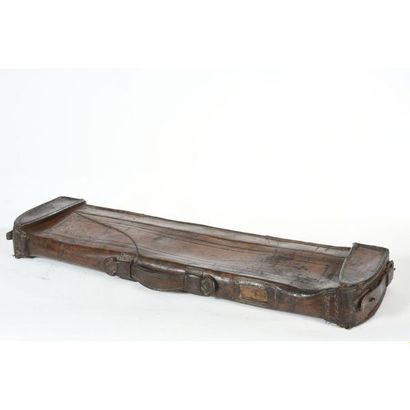 Brown leather rifle mallet with double opening....