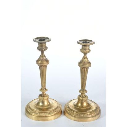 PAIR OF CANDLES LOUIS XVI in gilt bronze...