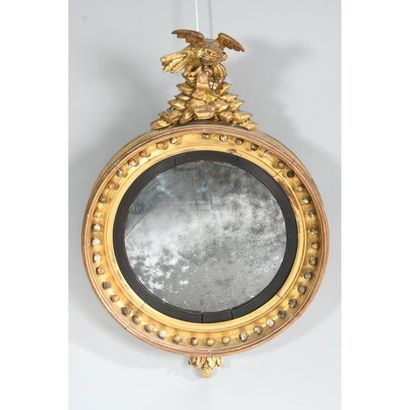 MIROIR DE SORCIERE EMPIRE en bois doré et...