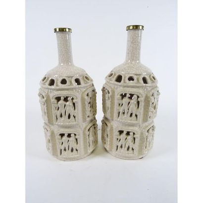2 SUSPENSIONS in the shape of a bottle in...