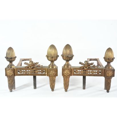 PAIR OF LOUIS XVI PINE CONE CHENETS in patinated...