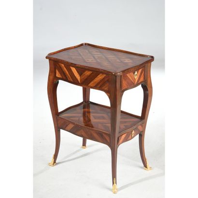 LOUIS XV LIVING ROOM TABLE with an eventful...