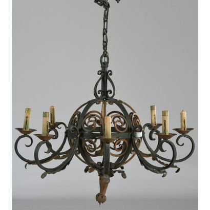 Cast iron chandelier in spherical shape with...