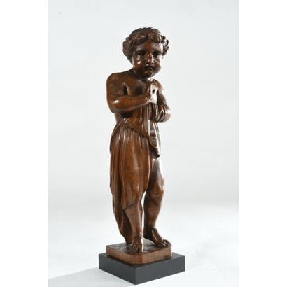SUJET en bois représentant un Angelot. France,...
