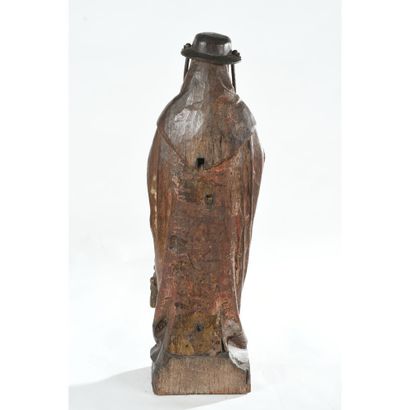 SUBJECT in patinated oak representing Saint...