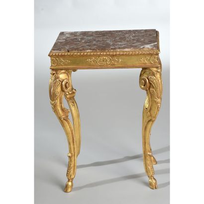 REGENCY TABLE in carved and gilded wood with...