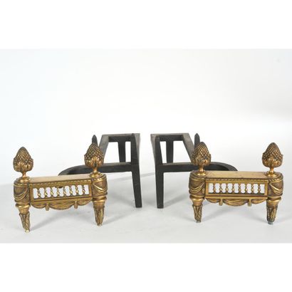 PAIR OF LOUIS XVI STYLE CHENETS in gilt bronze...