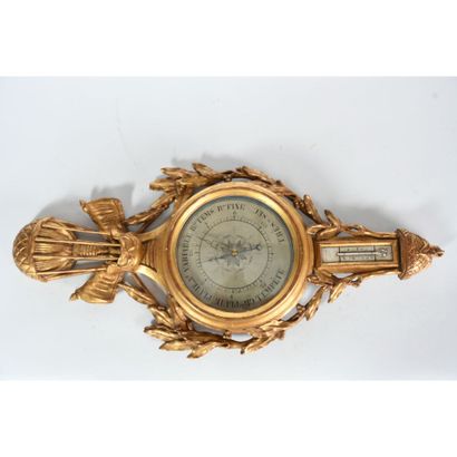 Gilded and carved wood barometer in the LOUIS...