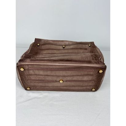 Yves SAINT LAURENT. Leather and suede bag...