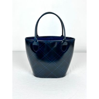 LONGCHAMPS. Bucket bag in squared waxed canvas....