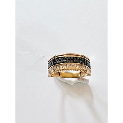 3 gold ring set with a line of white stones....
