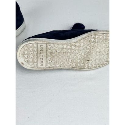 UNÜTZER. Pair of blue suede slippers decorated...
