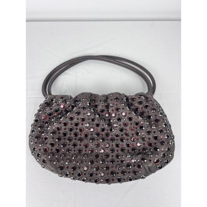 Sonia RYKIEL. Brown leather bag decorated...