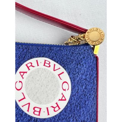 BULGARI. Clutch in blue canvas printed with...