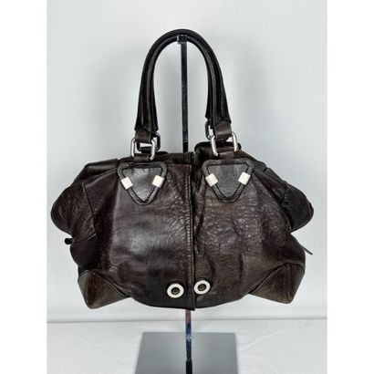 Sonia RYKIEL. Brown aged leather bag. 2 leather...