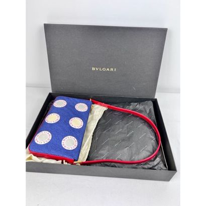BULGARI. Clutch in blue canvas printed with...