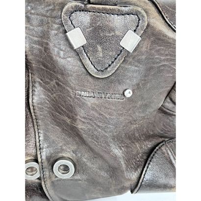 Sonia RYKIEL. Brown aged leather bag. 2 leather...